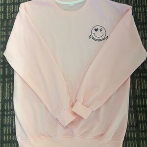 In my Cheer Mom Era Pink Smiley Face Sweatshirt
